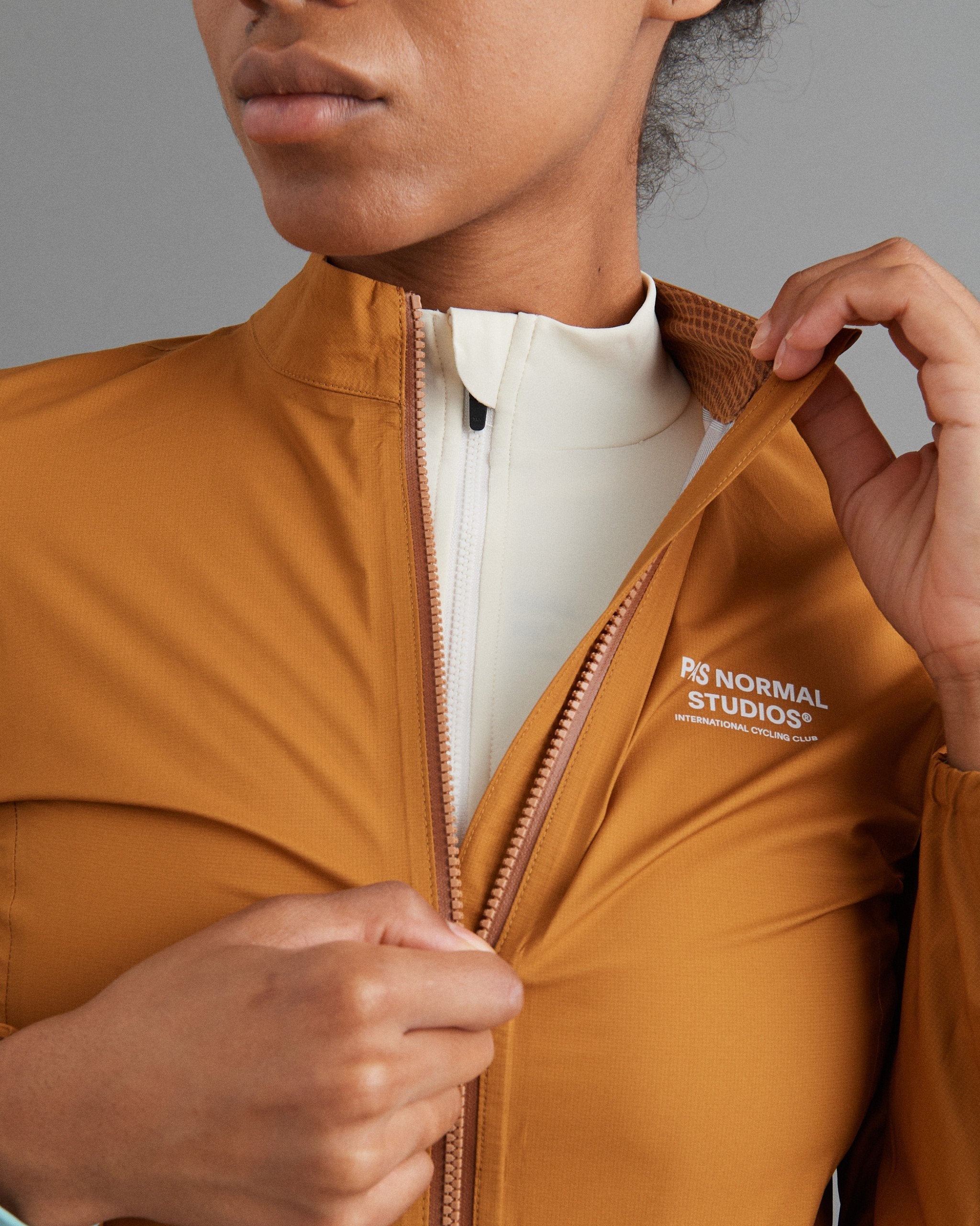 Women's Mechanism Pertex Rain Jacket - Burned Orange